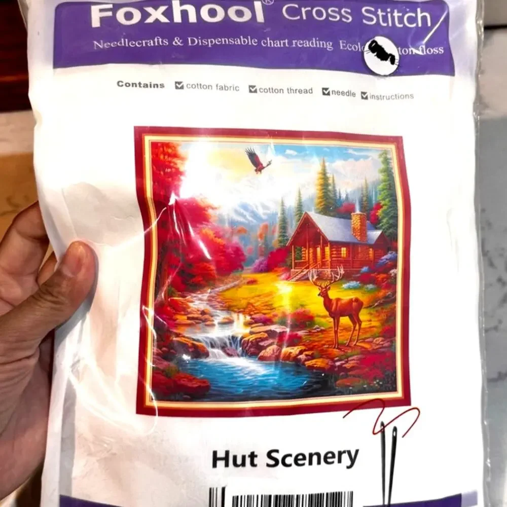 Foxhool Cross Stitch Kit Hut Scenery design with a cabin, deer, and waterfall